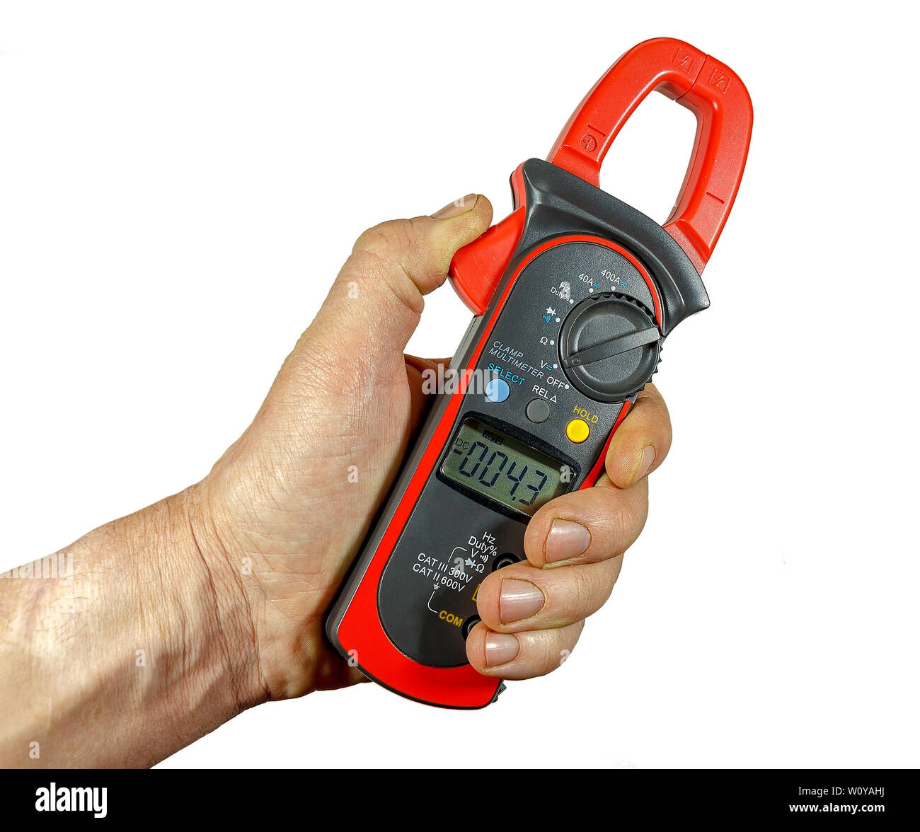 A device for measuring voltage, current, resistance in the hand on a white background.  isolated.  clamp multimeter. Stock Photo