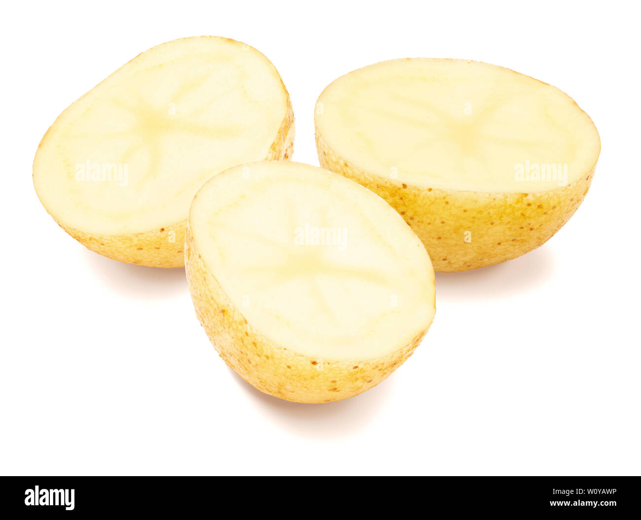Three beautiful potatoes cut in half (slices). Isolated on white ...