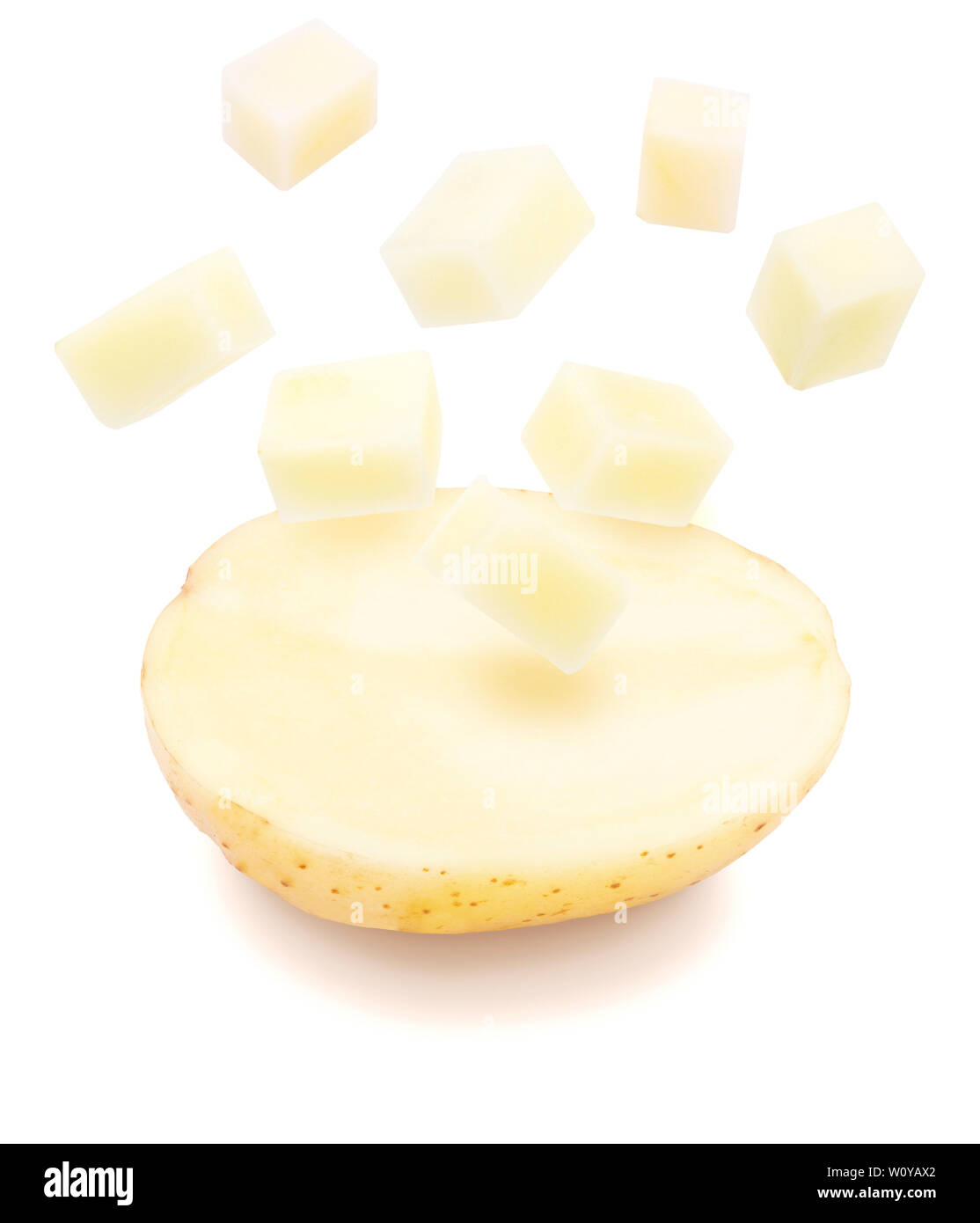 Funny potato cut in half with explosion of dice (cubes). Isolated on