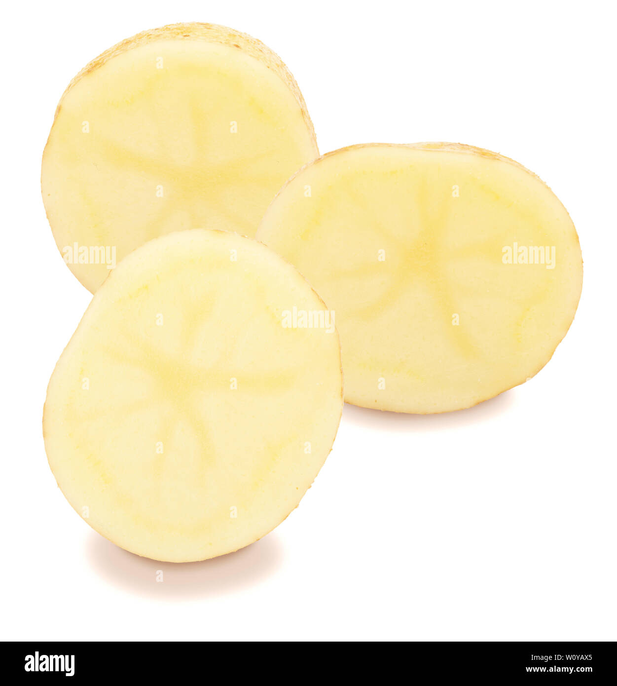 Three beautiful potatoes cut in half (slices). Isolated on white ...