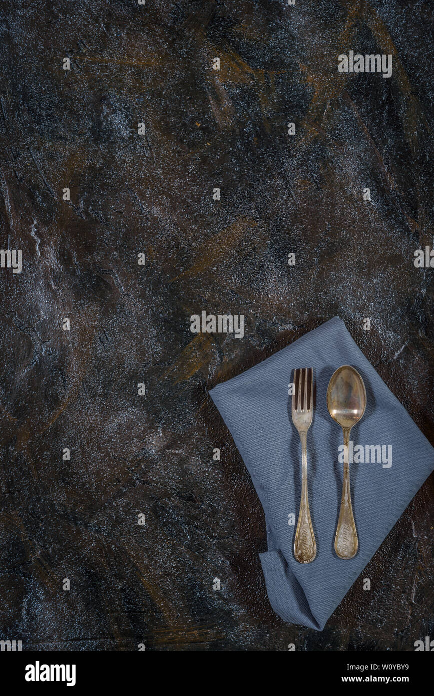 Cutlery on a dark rustic background Stock Photo