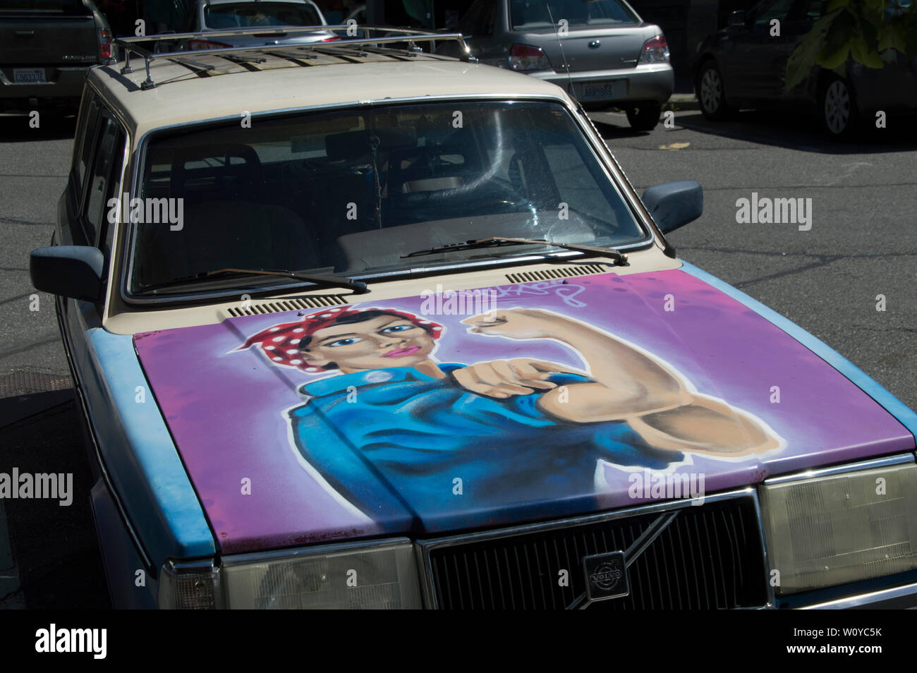 We Can,painting of famous World War II poster on the hood of a car parked in Bellingham,Washington. Stock Photo