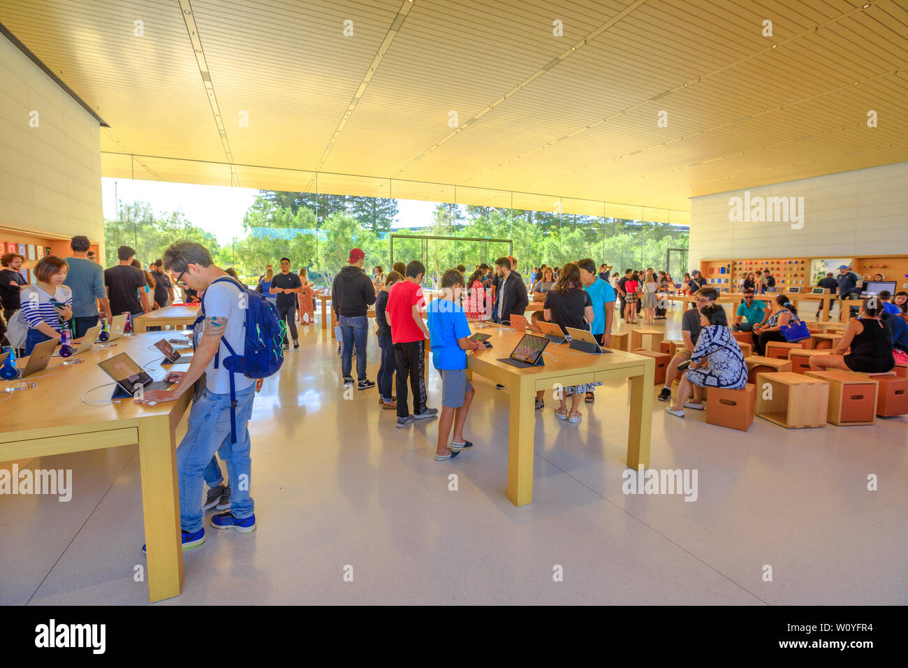 Cupertino, CA, United States - August 12, 2018: interior with many customers in the new Apple store and HQ of Apple Park Visitor Center, Tantau Avenue Stock Photo