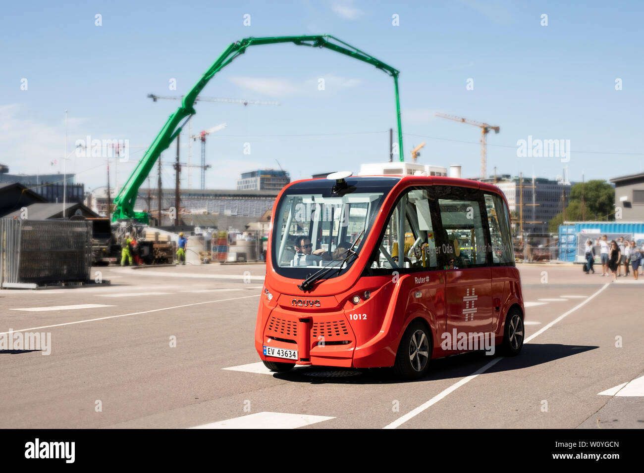 Ruker self-driving bus taking passengers around the port area in Oslo, Norway. Stock Photo