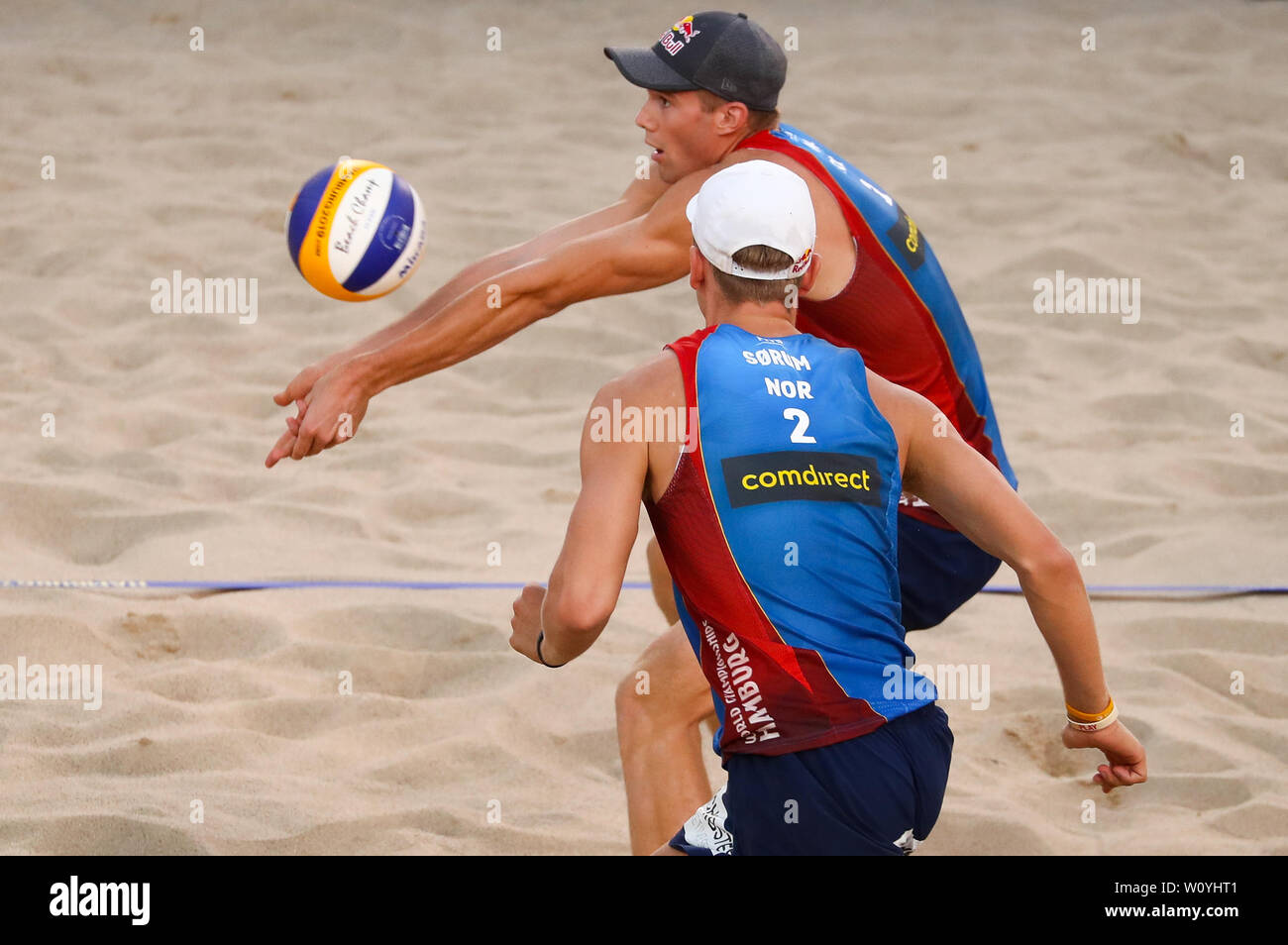Hamburg, Germany. 28th June, 2019. Beach volleyball, World Cup, in the Rothenbaum Stadium: preliminary round men, Anders Berntsen Mol (l) and Christian Sandlie Sorum in action on the Center Court. Credit: Christian Charisius/dpa/Alamy Live News Stock Photo