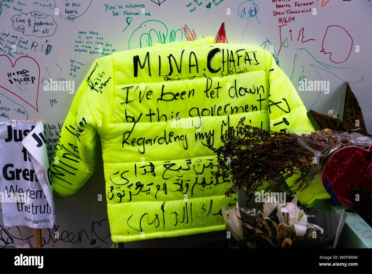 Messages of grief surrounding the memorial wall, Grenfell Tower, London. Stock Photo