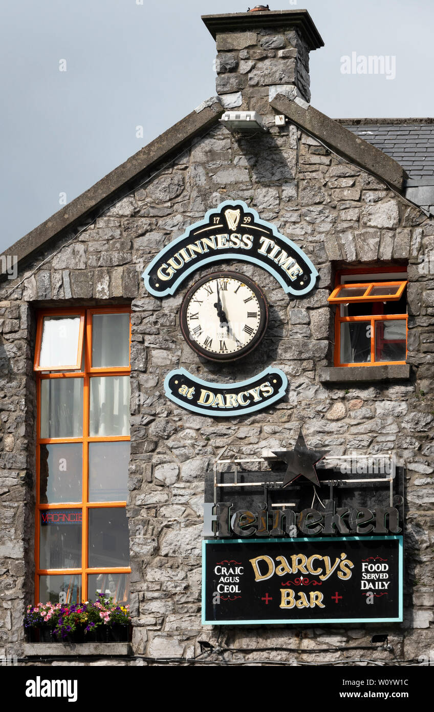 Guinness Time clock and sign outside Darcy&rsquo;s Bar in Galway 