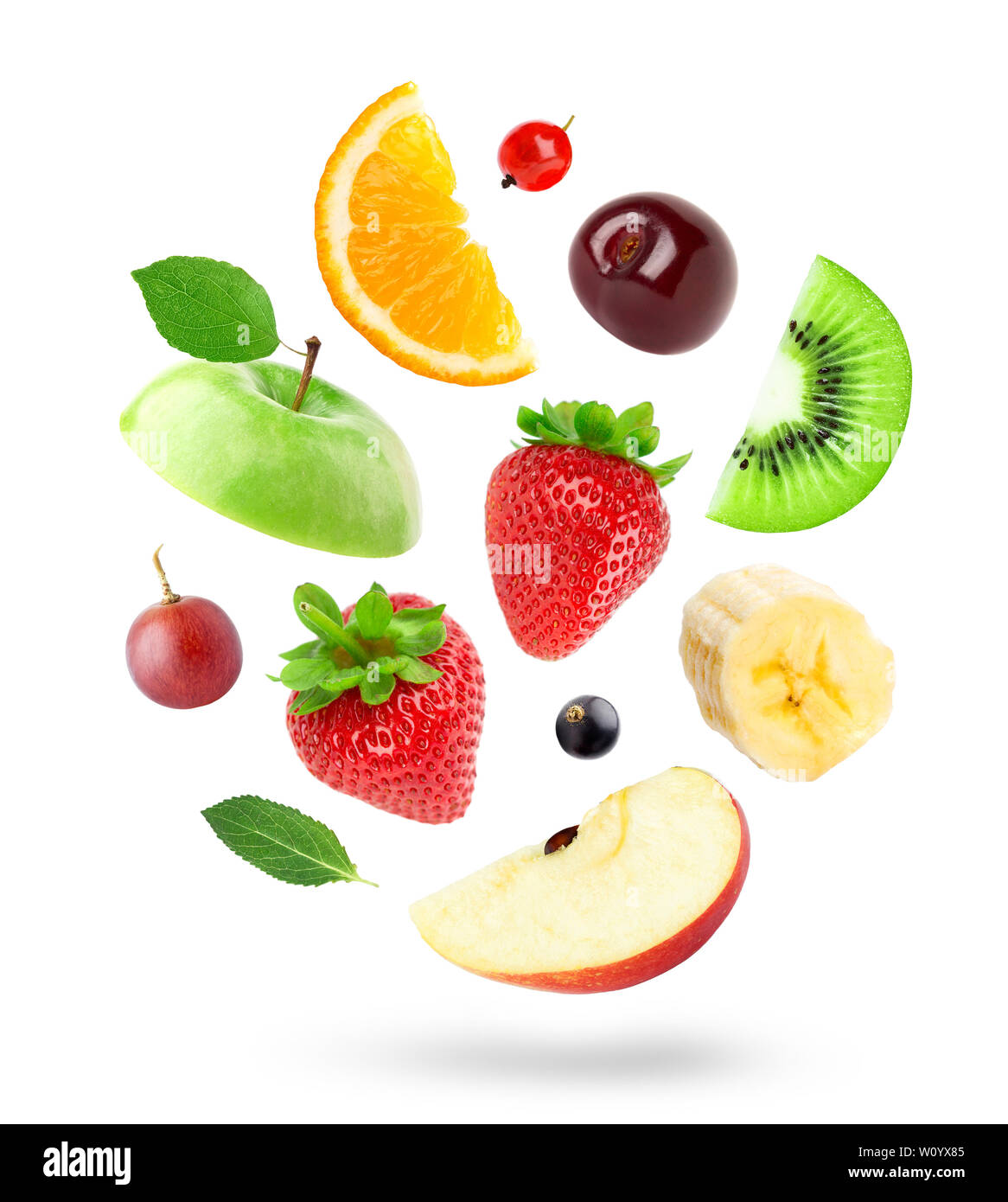 Mixed fruits on white background. Fruits falling Stock Photo