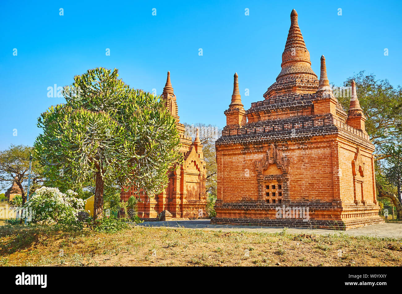 Bagan archaeological zone boasts unique ancient shrines and temples, preserved in tropical savannah landscape, Myanmar Stock Photo