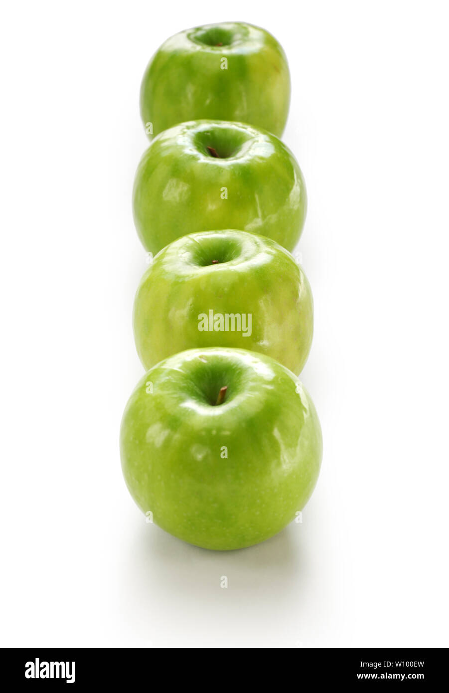 four green apples isolated on white background Stock Photo