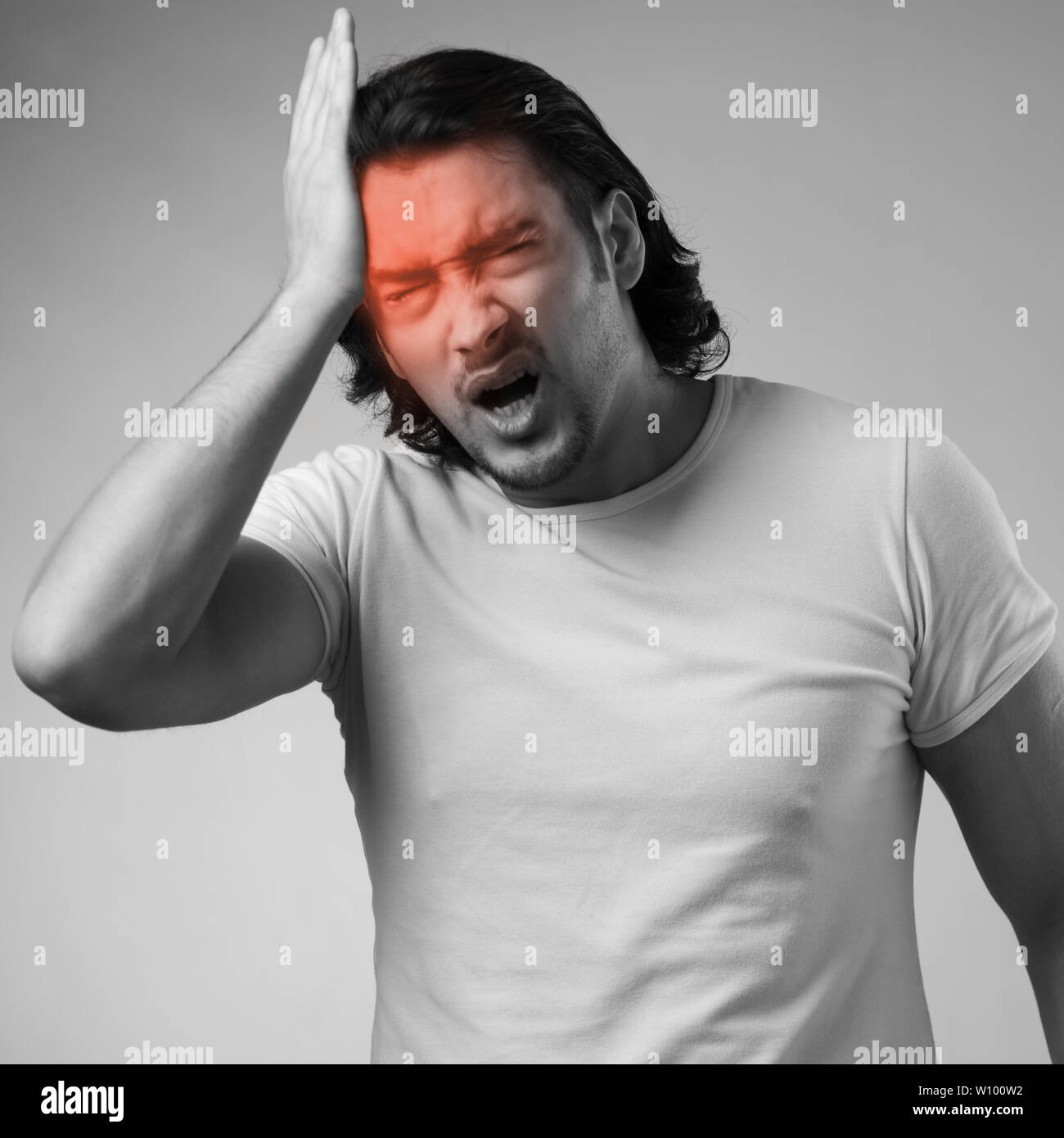 Man suffering from acute headache Stock Photo