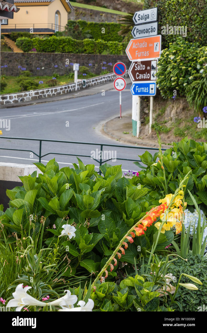 Direction signpost at a crossroads of roads in Salga, Sao Miguel island, Azores archipelago, Portugal Stock Photo