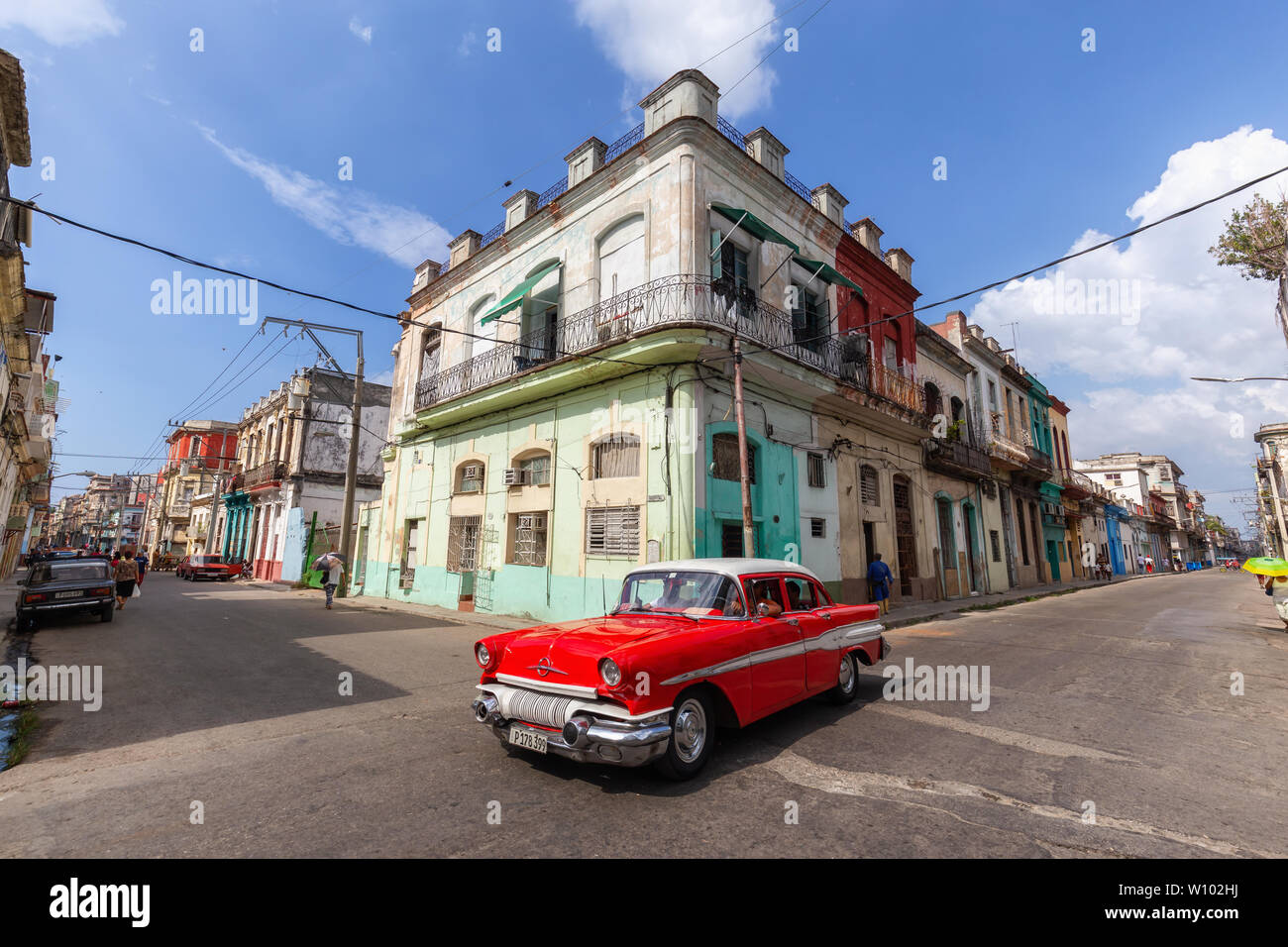 Havana, Cuba - May 14, 2019: Classic Old Taxi Car in the streets of the Old Havana City during a vibrant and bright sunny morning. Stock Photo