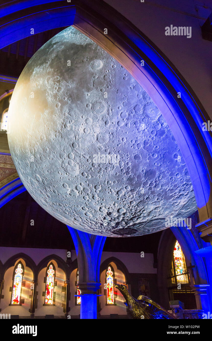 Bournemouth, Dorset UK. 28th June 2019. Dorset Moon, a celebration of the first moon landing 50 years ago featuring Luke Jerram’s internationally acclaimed Museum of the Moon measuring 7 meters in diameter in St Peters Church. A full programme of free lunar-inspired events create an experience that is out of this world over the three days starting today. The moon looks different in the evening than earlier in the day. Credit: Carolyn Jenkins/Alamy Live News Stock Photo