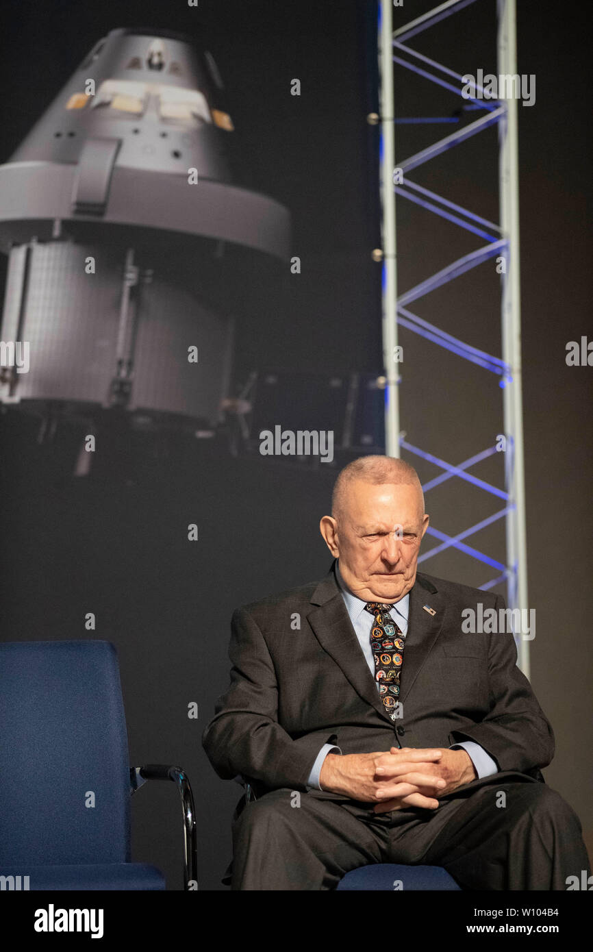 During a ceremony at NASA's Johnson Space Center, retired Apollo 11 Flight Director Gene Kranz listens as he waits to give his recollections of the day almost 50 years ago when the U.S. landed men on the moon. The Mission Control Center was later dedicated after a multi-million dollar restoration effort to coincide with the 50th anniversary celebration. Stock Photo