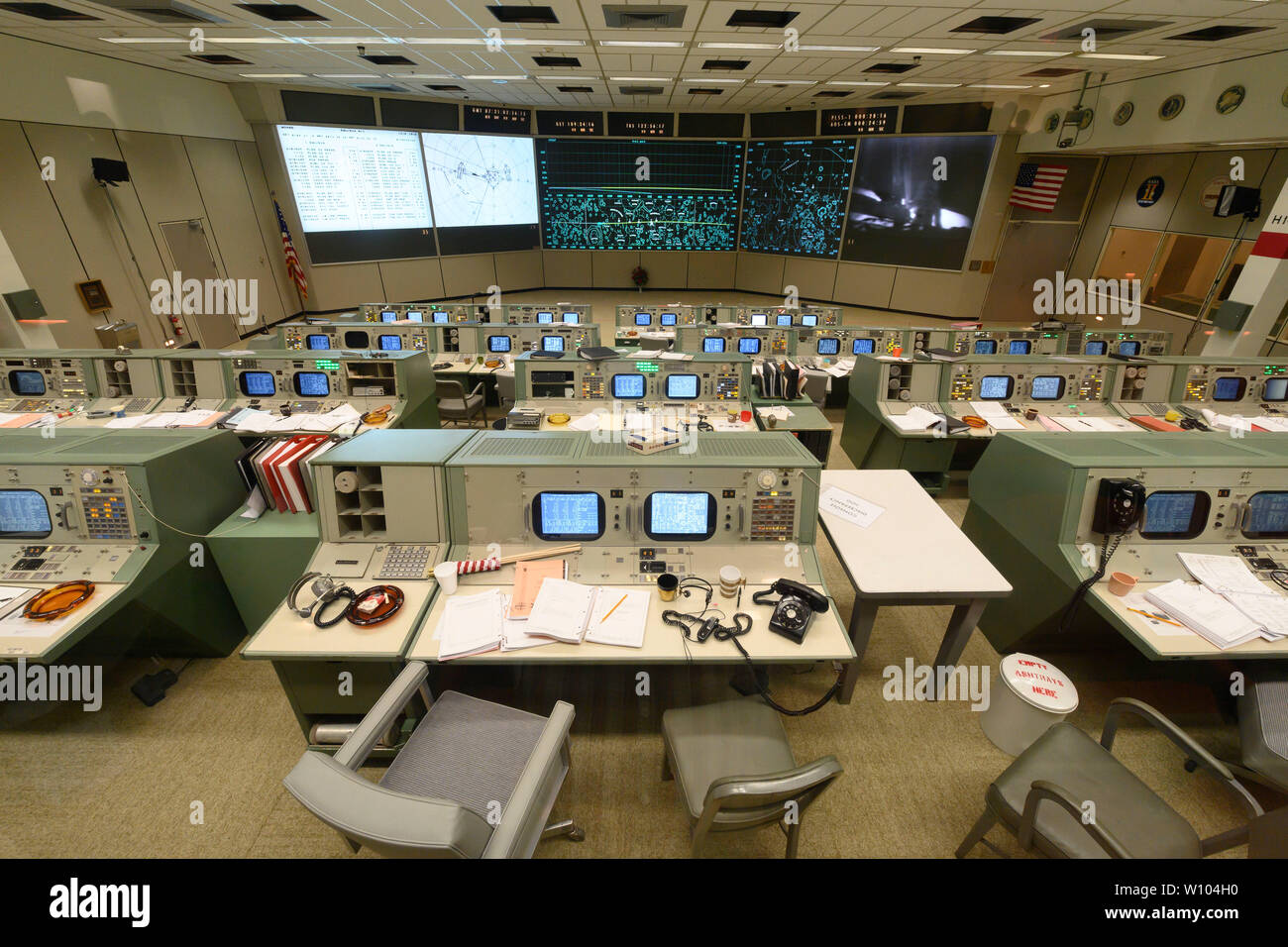 Mission Control Center at NASA Johnson Space Center in Clear Lake near Houston, Texas, newly restored to its 1960s version to commemorate the 50th anniversary of man's first steps on the moon in July 1969 by Apollo 11 astronauts. After its launch from the Kennedy Space Flight Center in Florida, the Apollo 11 moon landing and return to earth was controlled from this facility. Stock Photo