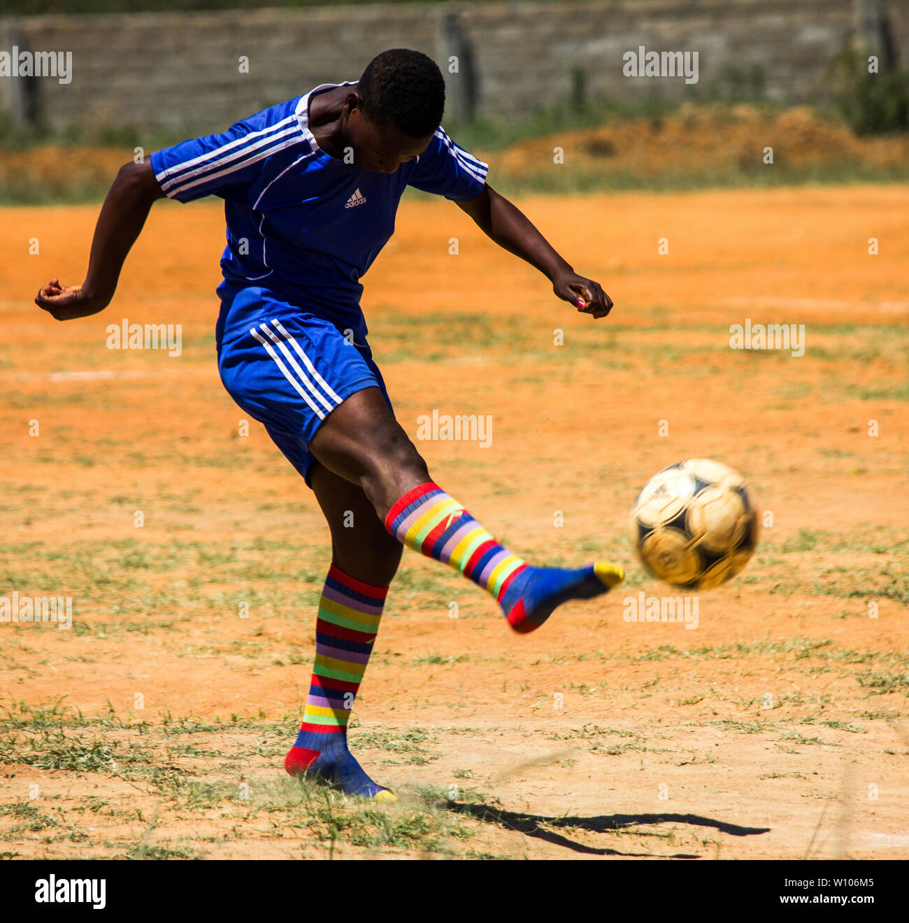 Soccer ball kick girl hires stock photography and images Alamy