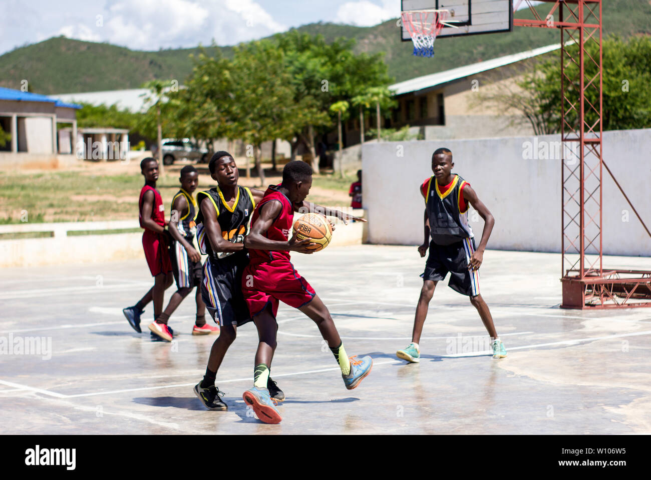 Boys playing basketball in the School Sports Games Festival in Chinhamapere  Secondary School Stock Photo - Alamy