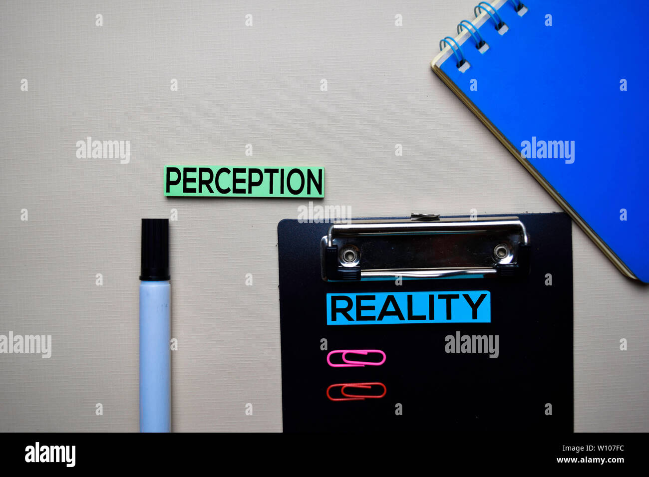 Perception or Reality text on sticky notes with office desk concept Stock Photo