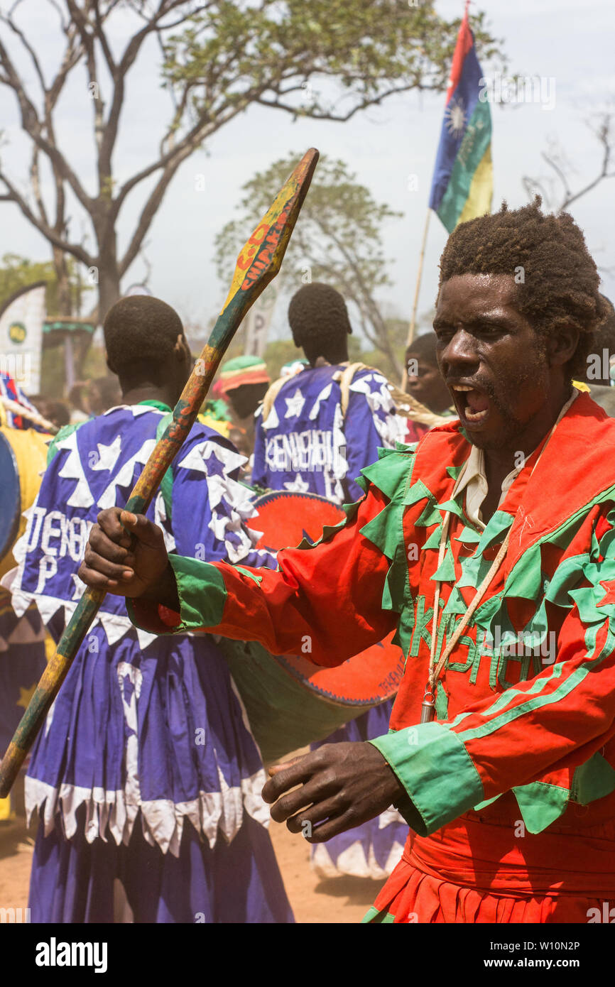 African men from Sent Luke's Apostolic Ejuwel Jekenisheni Church  dancing and playing strap drums Stock Photo