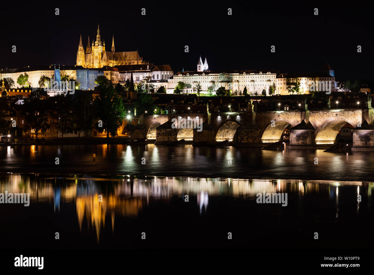 Charles bridge, famous landmark and travel destination at night in Prague, Czech Republic Stock Photo