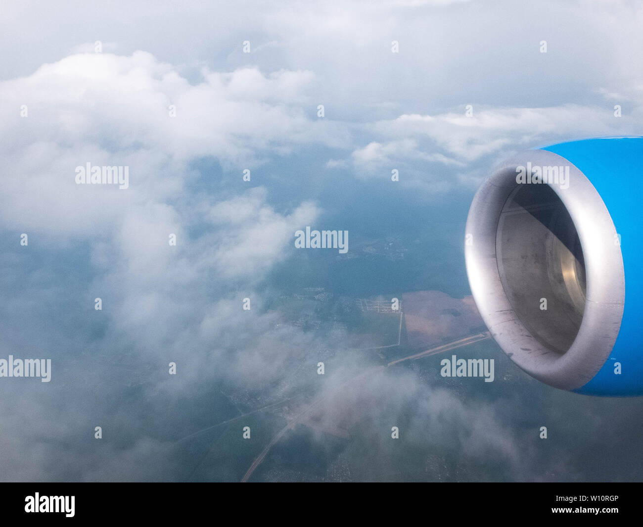 Airplane wing clouds from cabin hi-res stock photography and images - Alamy