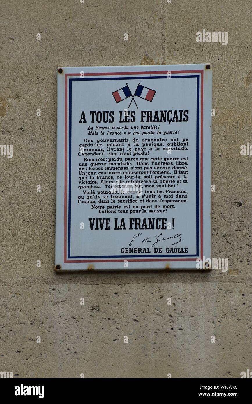 An enamel sign reproduction of a French WW2 poster published by Charles De Gaulle on a wall in the 4th arrondissement, Paris, 24th June 2019 Stock Photo