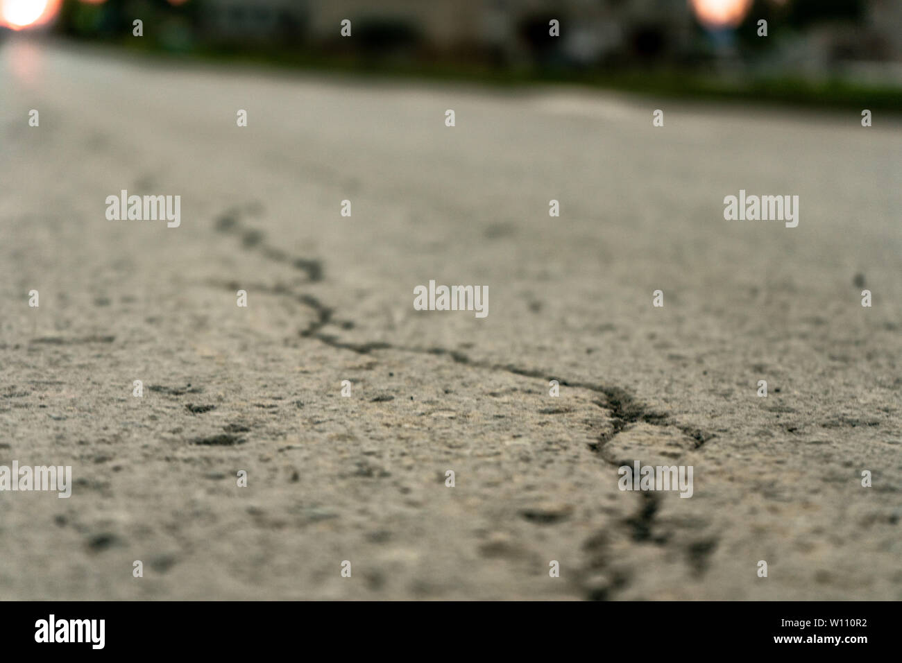 Focused on cracked asphalt road. crack in asphalt Stock Photo Alamy