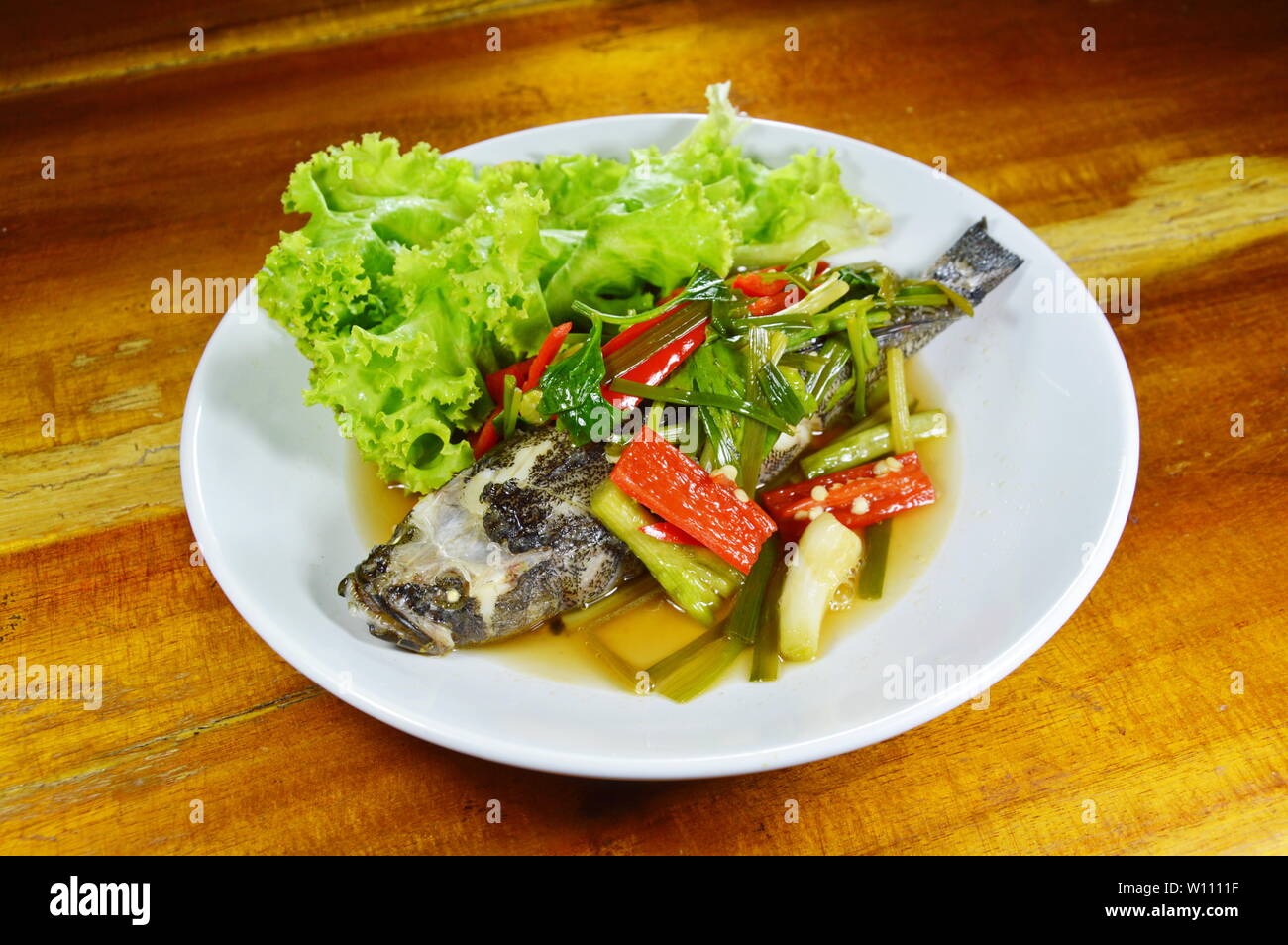 Steamed Sand Goby Fish With Soy Sauce On Dish Stock Photo Alamy