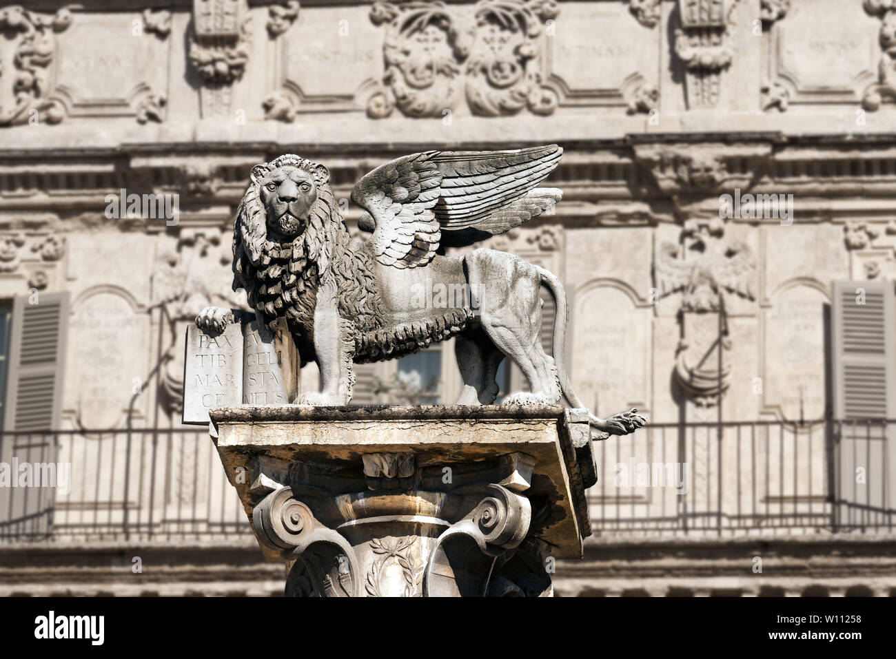 The winged lion of St Mark, symbol of the Venetian Republic, in Piazza delle Erbe, Verona (UNESCO world heritage site), Veneto, Italy Stock Photo
