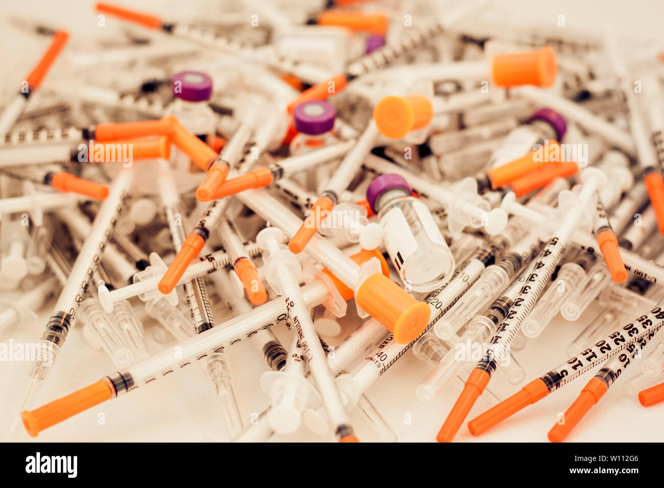 Pile of medical syringes for insulin for diabetes Stock Photo