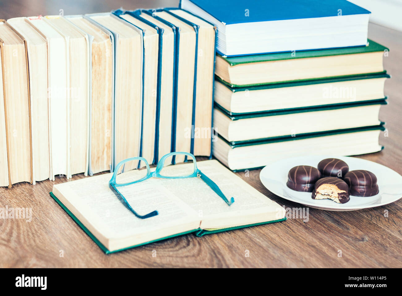 Stack of books open book hi-res stock photography and images - Alamy