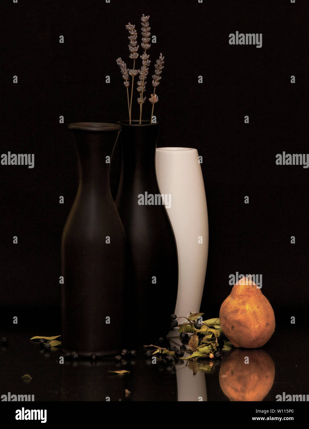 Still Life - Vase, flowers and fruits on a black background Stock Photo ...