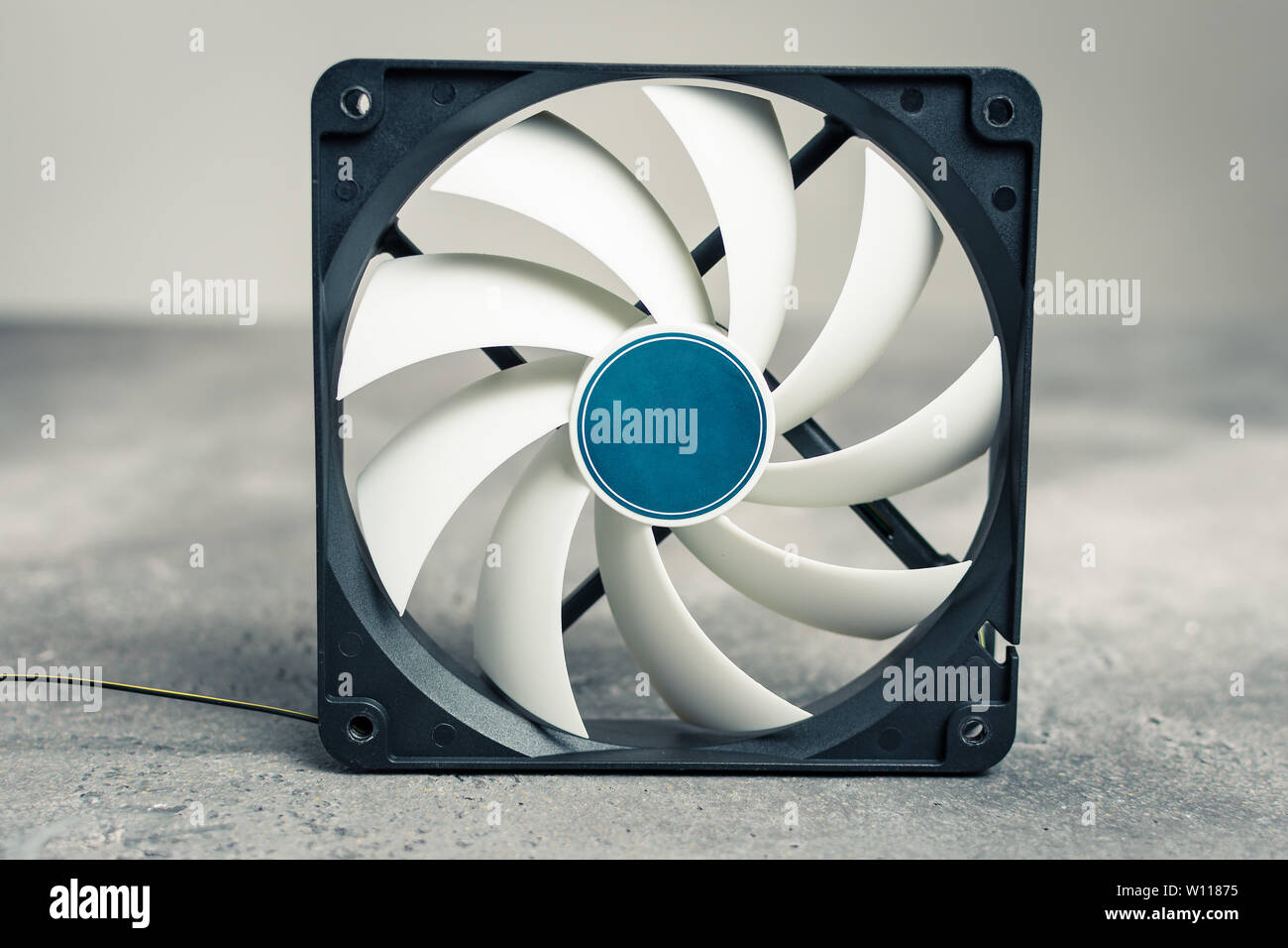Computer Cooler Fan CPU or PC Case on Dark Background Stock Photo