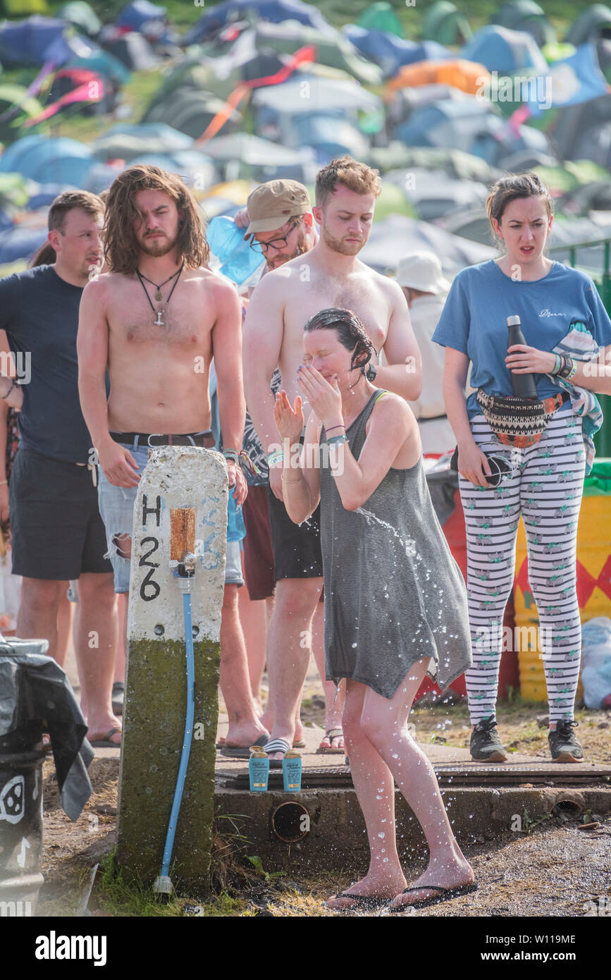 Glastonbury festival showers hires stock photography and images Alamy