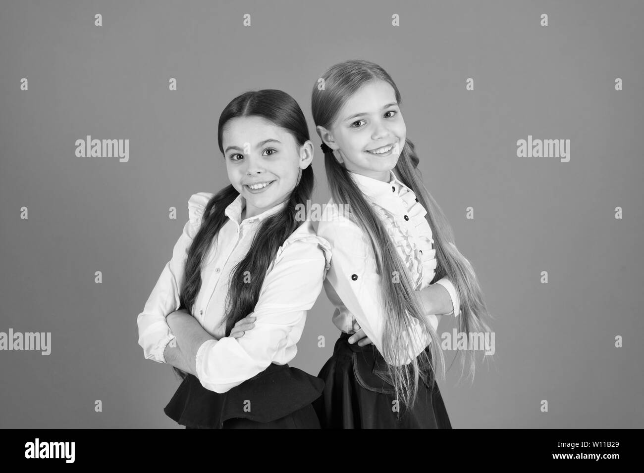 Girl dressed in a school uniform Black and White Stock Photos & Images