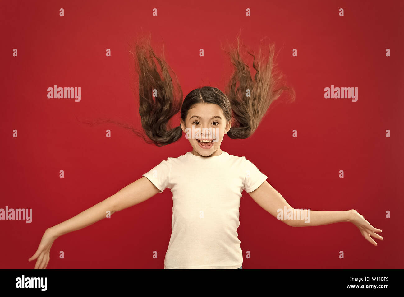 Beauty In Motion Happy Little Girl With Stylish Ponytail