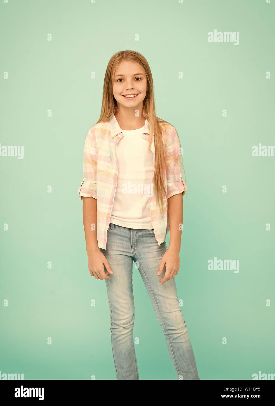 Fashion design makes the baby so cute. Little girl with long blond