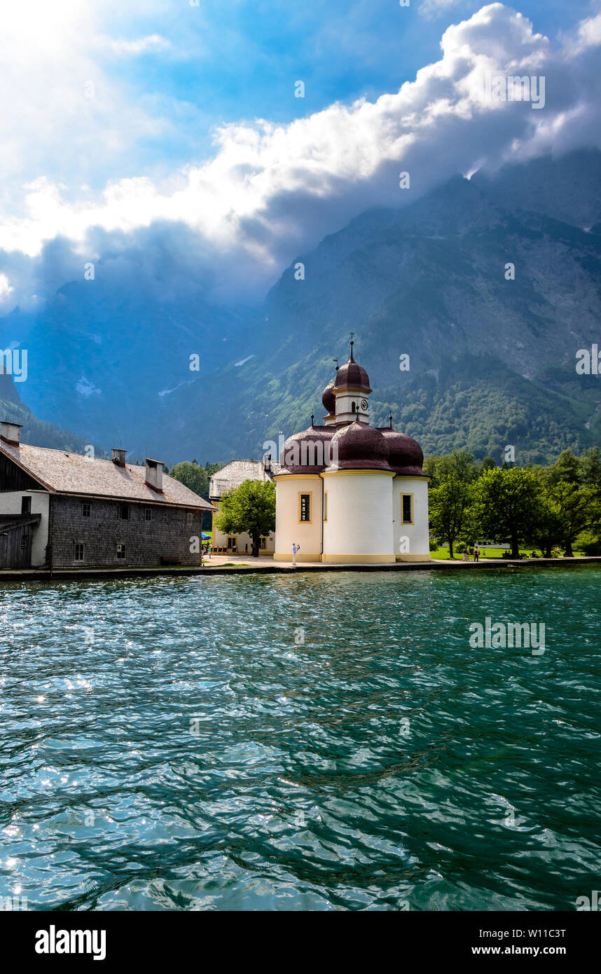 Church St. Bartholomew with Watzmann by Konigsee (Koenigsee) lake. Bayern (Bavaria), Germany. Stock Photo