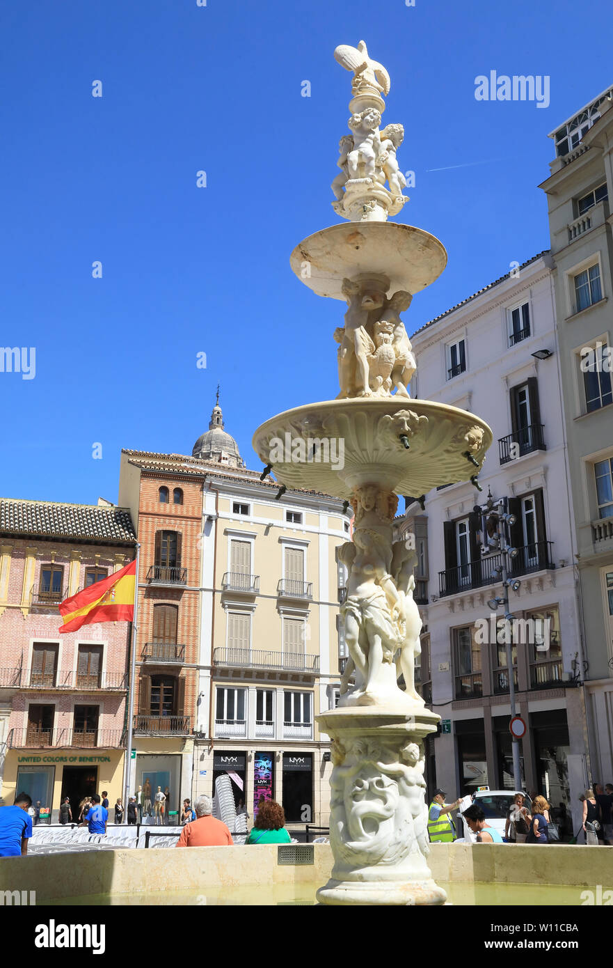 The fountain on the Plaza de la Constitucion, in Malaga city's old town ...