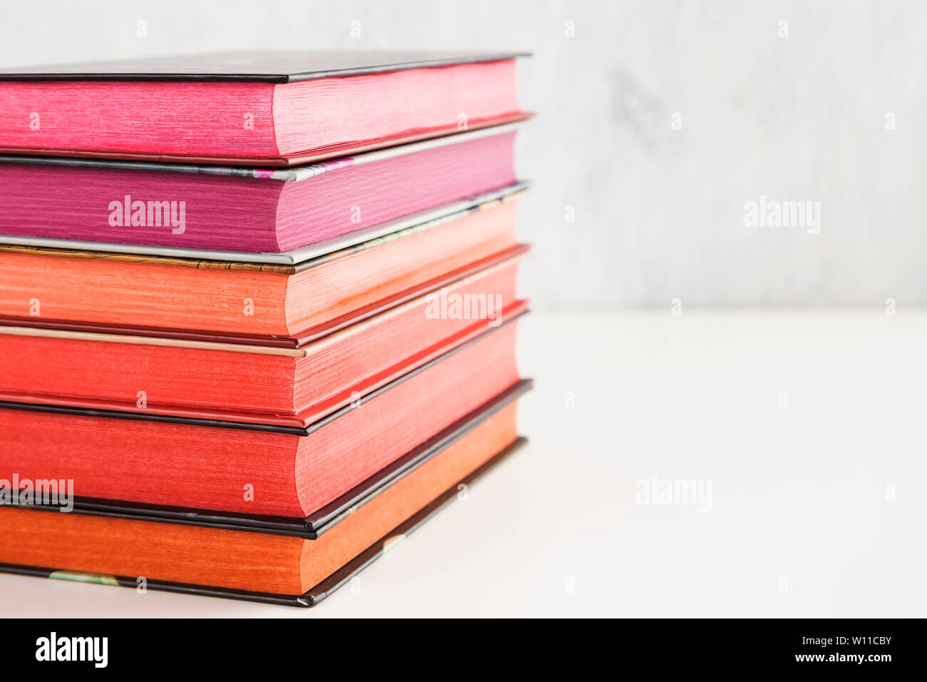 Pile of books with color stack on white background. Copy space Stock ...