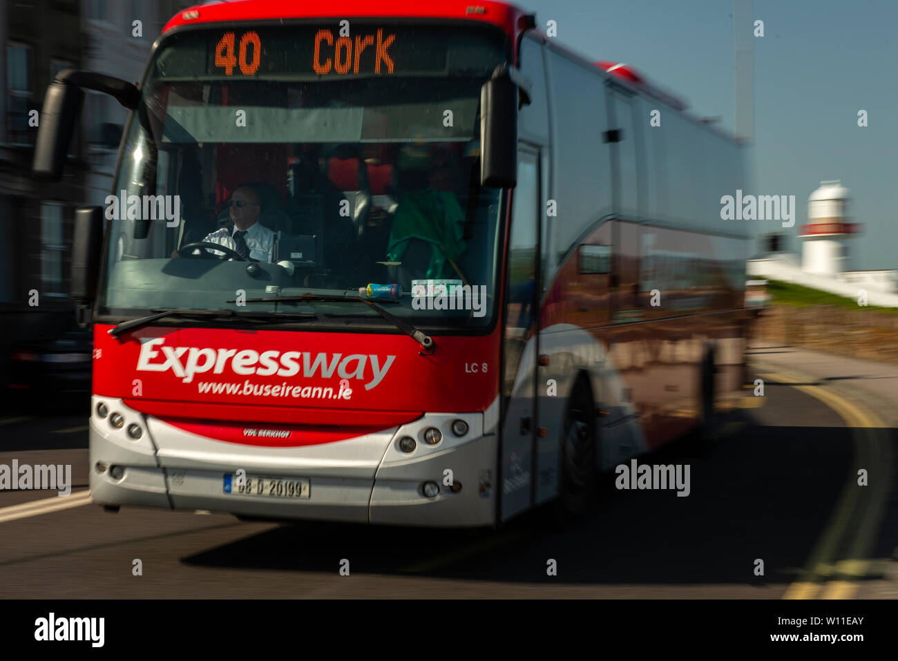 Expressway coach by Bus Eireann Transport for Ireland on the move passing  by the Youghal Lighthouse in Youghal, County Cork, Ireland Stock Photo -  Alamy