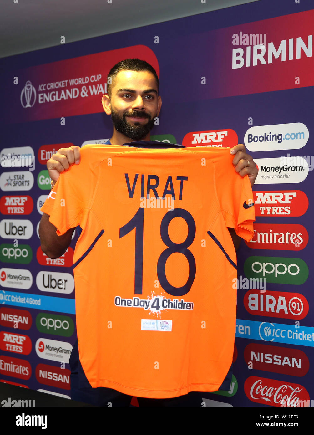 India's Virat Kohli holds up the new India shirt during the press  conference at Edgbaston, Birmingham Stock Photo - Alamy