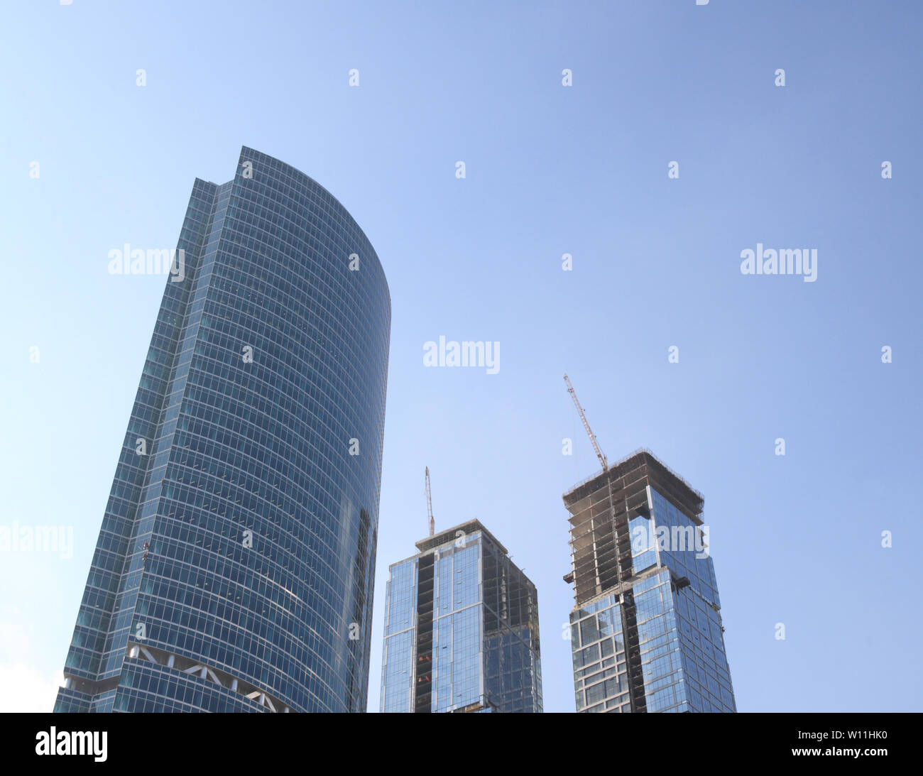 skyscraper develop on sky background at day Stock Photo - Alamy