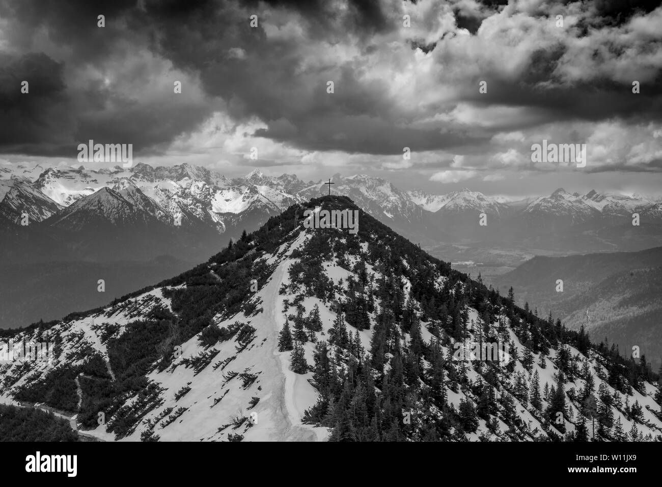 Cross; Christ; top; mountain; hill; hilltop; Herzogstand; European; Alps; Bavaria; Germany; black and white; sky; copy space; copy-space; faith; hope; Stock Photo