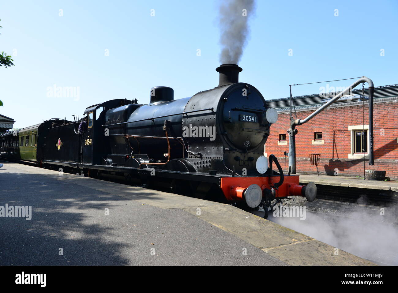 An SR Q class locomotive in steam on the Bluebell Railway Stock Photo ...