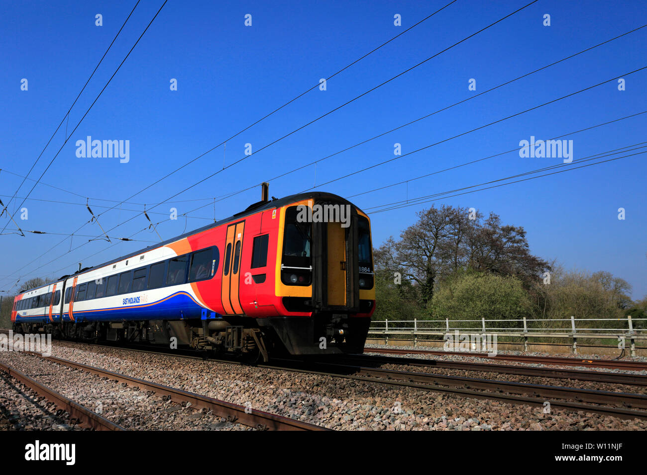 East Midlands trains 158 864, East Coast Main Line Railway, Peterborough, Cambridgeshire, England, UK Stock Photo