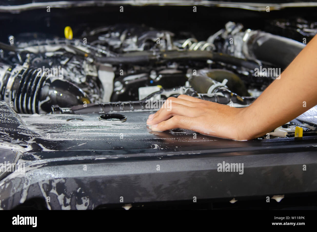 Cleaning engine with the foam Stock Photo Alamy