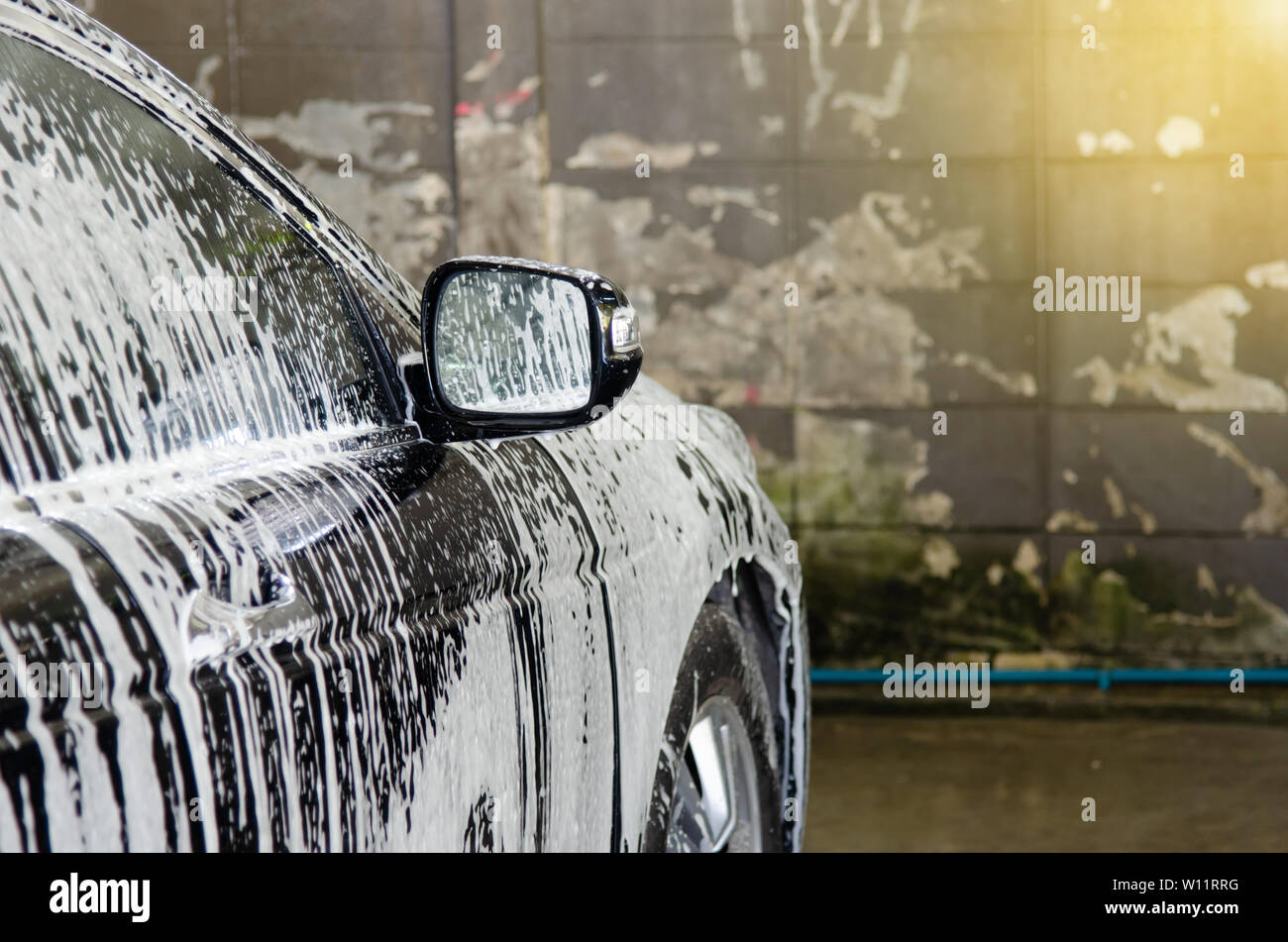 Car wash black with foam bubbles Stock Photo Alamy