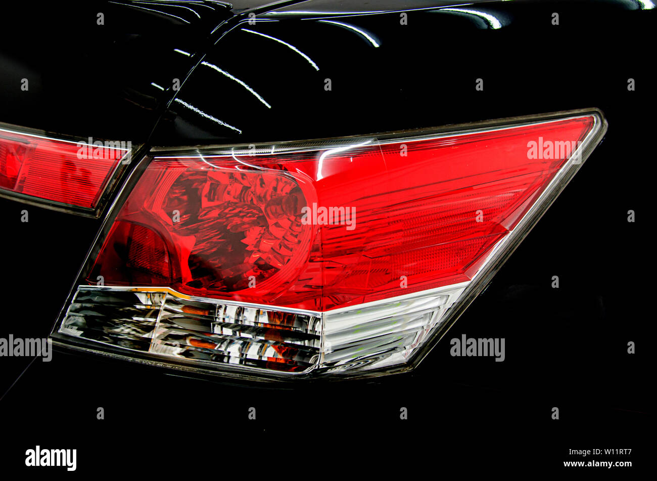 Luxury car tail light on a black background Stock Photo Alamy